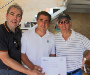 Con Horgan receives his Golf prize frpm Gonzalo Ceballas and xxxxx in Palma.