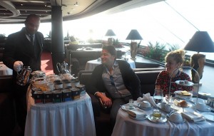 Yacht Club butler Harrison serves Royal Scottish tea for Lorenzo Diamantini and Rebecca Kelly, MSC Cruises UK & Ireland