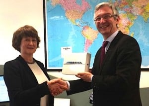 Deirdre Russell, Star Travel, is presented with her prize by Alan Sparling, Country Manager for SAS (GSA)