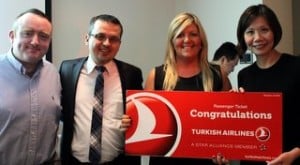Tom Britton, Marble City Travel,Murat Balandi, Turkish Airlines presents Gillian Purser, Marble City Travel with two tickets to Singapore, with Jaisey Yip from Changi Airport.