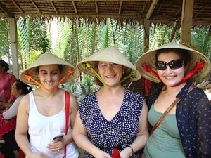 Travel Counsellors Andre Bedford, Mary Foyle and Kathy O’Sullivan adopt the local style in Vietnam