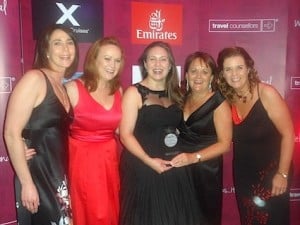 A delighted Annabel Cove, Business Development Manager, DoSomethingDifferent.com (centre) receives the Business Partner of the Year Award from Ciara MacConnell, Bernie Whelan, Cathy Burke and Sinead Cregan-Hayes, Travel Counsellors Ireland