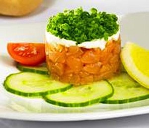 Salmon Tartar tower with creme fraiche and chives