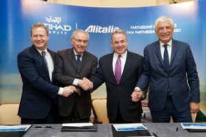 Etihad Airways’ Chief Financial Officer, James Rigney; Alitalia Chairman, Roberto Colaninno; Etihad Airways’ President and Chief Executive Officer, James Hogan; and Alitalia Chief Executive Officer Gabriele Del Torchio mark the official signing of the investment deal in Rome, Italy.