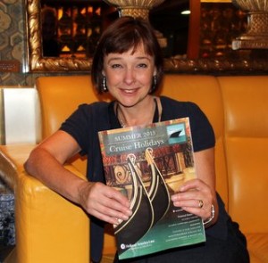 Holland America's marketing manager for the UK and Ireland, Andrea Perkins with the Summer 2015 Cruise Holidays brochure.