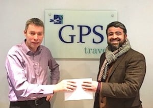 On behalf of Claire Brien, GPS Travel, Gordon Pullen accepts the €100 cheque from Lee Osborne, BookaBed