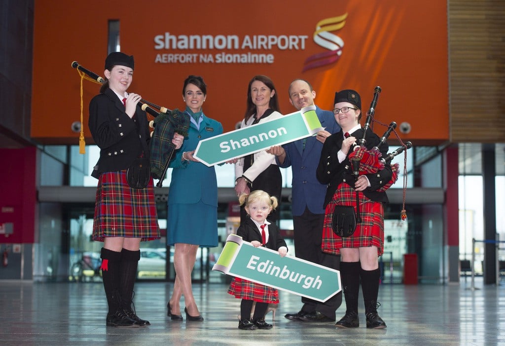  Pictured at the Aer Lingus Regional announcement of their Shannon to Edinburgh route are Aer Lingus Regional cabin crew Amy Scott, left, and Calvin Long, right, along with Shannon Group acting CEO Mary Considine and CBS Sexton Street Pipe Band members Niamh Hickey aged 15, left, Aoife McDarby aged 12, right, and Clodagh Purcell, aged 2.
