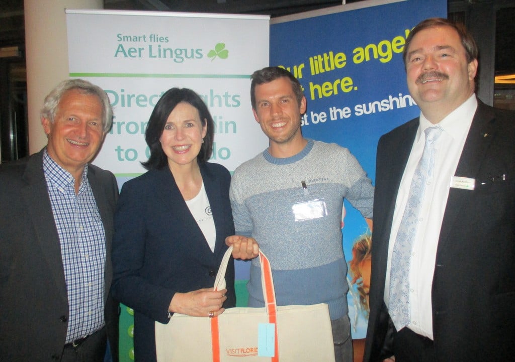 Colin Brodie,Oonagh McCullagh, present Ronan Gannon  from Trailfinders  with his prize with John Keogh ,Aer Lingus.