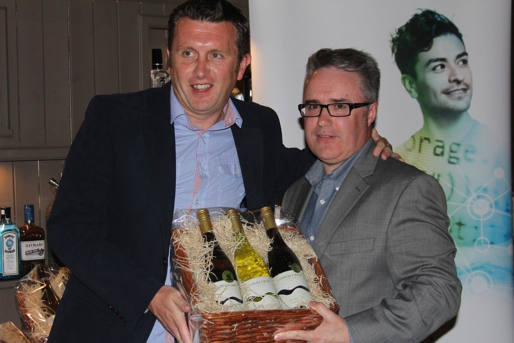 Graham Hennessy  reciving his prize for the best Front nine from David Conlon