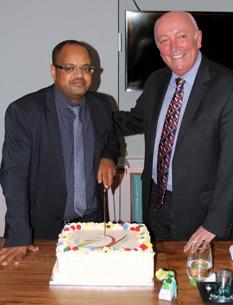 Cake celebrations as Michael Youniss and ITAA President -Cormac Meehan do the cutting. 