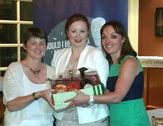 Eileen Penrose, Ladies Category 1 winner, receives her prize from Julie Curran, Turkish Airlines, and TIGS Captain Tanya Airey