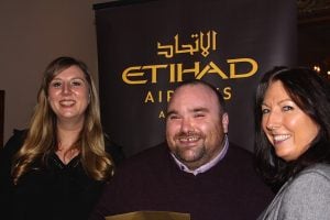 Will Walsh, Click&Go, receives his prize of a fam trip to Thailand from Emma Arnott, Amazing Thailand, and Karen Maloney, Etihad Airways