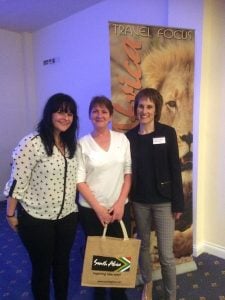 Winner of a place on an educational to South Africa, Geraldine Dolan, Society Travel (centre) receives her prize from Nina Farrimond, South African Tourism, and Anne O’Sullivan, Travel Focus