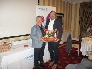 David Conlon, Travelport, presents Overall winner Lee Osborne, BookaBed, with his prize