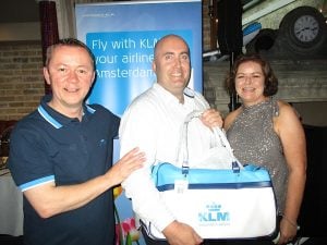 KLM prize-winner Rob Byrne, Trailfinders (centre), with Frank Caffrey and Teresa Murphy, KLM