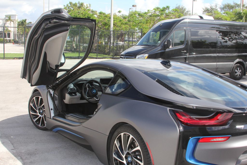 The BMW -I 8 with gull wing doors.