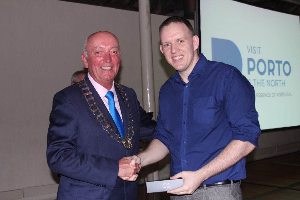 The President makes a presentation to AndrewMcCarroll fom AIB Merchant Services.