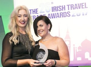 Tryphavana Cross, Las Vegas CVA, presents Joanne Madden, Travelport, with the ‘Best Agent Friendly Individual’ award