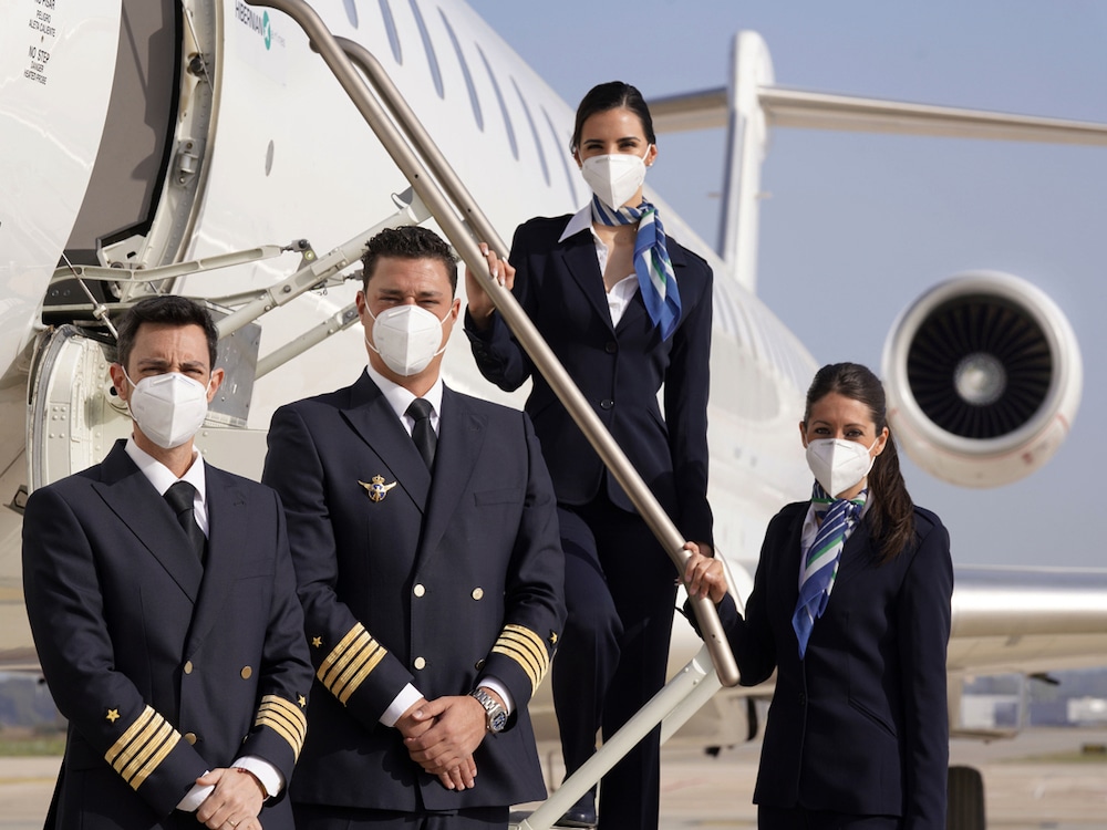 Hibernian Airlines aircraft and crew