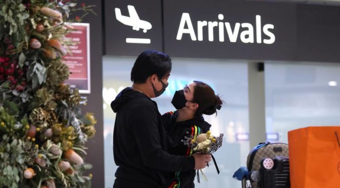 Hugs and tears as Western Australia ends its borders closures