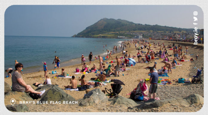 Bray Included in Time Out’s 14 Most Underrated Spots People on a clear day on Bray beach