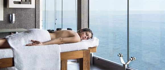 A woman enjoying a massage on a MSC Cruise ship