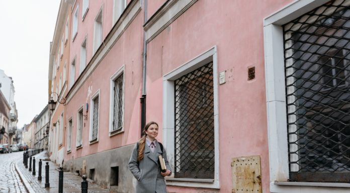 Helsinki Tops European City List for Walking A woman in an overcoat walks on a pavement in Europe