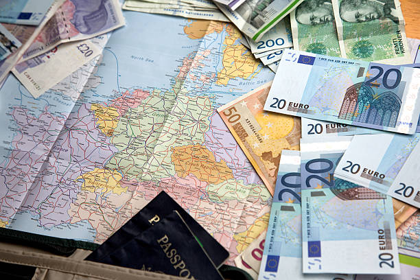 Map open to European countries with foreign currency scattered on top.